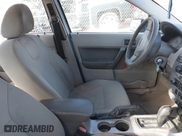 2008 Ford Focus S with VIN 1FAHP34NX8W223229, listed as a IAAI auction lot 38747770 with 232,432 mi miles. Bid and sale history available at carsss.com. Image 5.