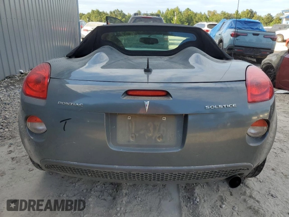 2009 Pontiac Solstice z VIN 1G2MN35B69Y105093, wystawiony jako Copart lot #72854034 z przebiegiem 82 333 mil mil oraz Szkoda całkowita • Salvage title. Historia ofert i sprzedaży dostępna na DreamBid. Obrazek 11.