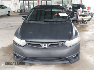 2007 Honda Civic Si z VIN 2HGFG21587H706281, wystawiony jako IAAI lot #42354556 z przebiegiem 258 174 mil mil oraz . Historia ofert i sprzedaży dostępna na DreamBid. Obrazek 6.