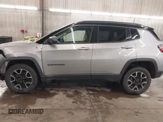 2019 Jeep Compass Trailhawk with VIN 3C4NJDDB8KT667863, listed as a IAAI auction lot 41944001 with 80,635 mi miles and . Bid and sale history available at DreamBid. Image 15.