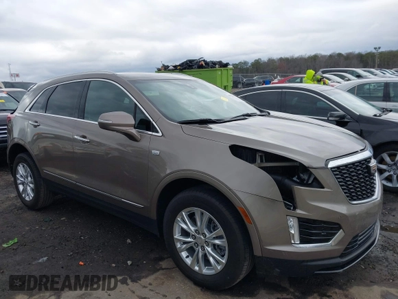 2023 Cadillac XT5 FWD Luxury z VIN 1GYKNAR45PZ140440, wystawiony jako IAAI lot #41723317 z przebiegiem 25 124 mil mil oraz . Historia ofert i sprzedaży dostępna na DreamBid. Obrazek 13.