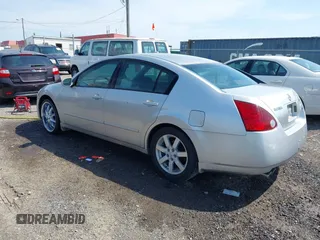 2004 Nissan Maxima SL with VIN 1N4BA41E84C822059, listed as a IAAI auction lot 42032195 with 213,650 mi miles. Bid and sale history available at carsss.com. Image 3.