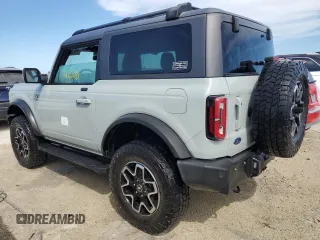 2021 Ford Bronco z VIN 1FMDE5CP4MLA65927, wystawiony jako Copart lot #74809974 z przebiegiem 41 296 mil mil oraz Nie do naprawy • Non repairable. Historia ofert i sprzedaży dostępna na DreamBid. Obrazek 2.