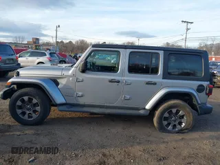 2018 Jeep Wrangler Unlimited Sahara z VIN 1C4HJXEN4JW173435, wystawiony jako IAAI lot #41453040 z przebiegiem 51 530 mil mil oraz . Historia ofert i sprzedaży dostępna na DreamBid. Obrazek 14.