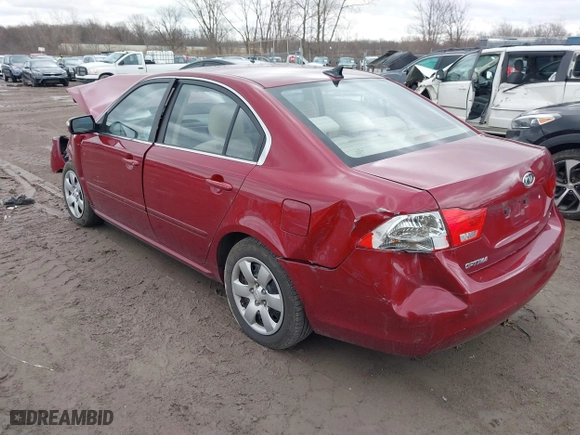 2009 Kia Optima LX with VIN KNAGE228295292892, listed as a IAAI auction lot 41812221 with 179,276 mi miles. Bid and sale history available at carsss.com. Image 3.
