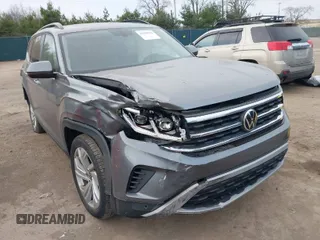 2021 Volkswagen Atlas 3.6L V6 SE w/Technology with VIN 1V2KR2CAXMC572050, listed as a IAAI auction lot 41010552 with 59,455 mi miles. Bid and sale history available at carsss.com. Image 1.