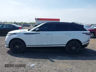 2020 Land Rover Range Rover Velar R-Dynamic S z VIN SALYK2EX4LA272072, wystawiony jako IAAI lot #41910957 z przebiegiem 63 823 mil mil oraz . Historia ofert i sprzedaży dostępna na DreamBid. Obrazek 14.