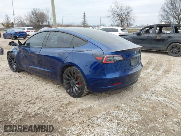 2021 Tesla Model 3 Performance with VIN 5YJ3E1EC6MF996743, listed as a IAAI auction lot 41509631 with 41,599 mi miles and . Bid and sale history available at DreamBid. Image 3.