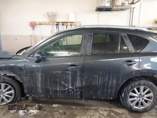 2015 Mazda CX-5 Touring with VIN JM3KE2CY2F0458114, listed as a IAAI auction lot 41545493 with 138,061 mi miles. Bid and sale history available at carsss.com. Image 15.