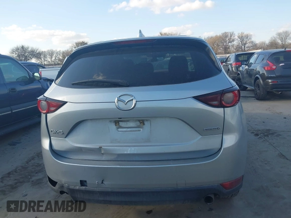 2020 Mazda CX-5 Touring with VIN JM3KFACMXL1786200, listed as a IAAI auction lot 41506139 with 121,944 mi miles. Bid and sale history available at carsss.com. Image 17.