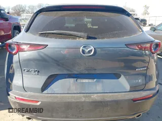 2023 Mazda CX-30 S Carbon Edition z VIN 3MVDMBCM9PM546687, wystawiony jako IAAI lot #41395628 z przebiegiem 13 878 mil mil oraz . Historia ofert i sprzedaży dostępna na DreamBid. Obrazek 17.