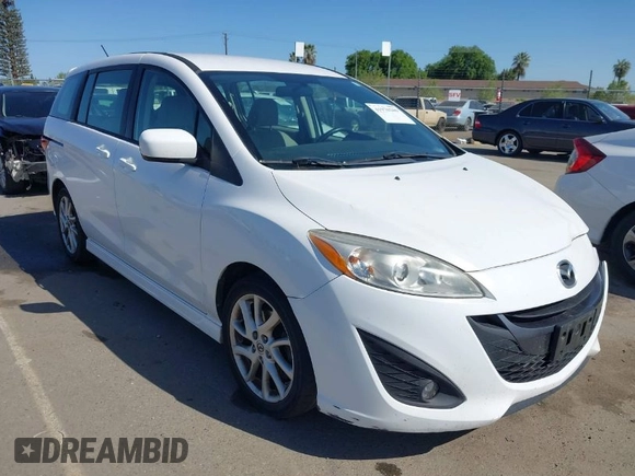 2012 Mazda 5 Touring with VIN JM1CW2CL7C0140452, listed as a IAAI auction lot 41970209 with 92,069 mi miles and . Bid and sale history available at DreamBid. Image 1.