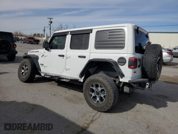 2021 Jeep Wrangler Unlimited Rubicon with VIN 1C4JJXFM6MW818162, listed as a Copart auction lot 42187885 with 34,273 mi miles and Salvage Title. Bid and sale history available at carsss.com. Image 2.