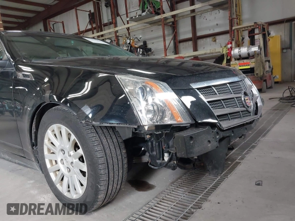 2011 Cadillac CTS Luxury with VIN 1G6DG5EYXB0145058, listed as a IAAI auction lot 41973156 with 143,246 mi miles and . Bid and sale history available at carsss.com. Image 12.