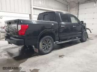 2017 Nissan Titan SV with VIN 1N6AA1E58HN502777, listed as a IAAI auction lot 41612504 with 142,920 mi miles. Bid and sale history available at carsss.com. Image 4.