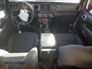 2022 Jeep Gladiator Willys with VIN 1C6HJTAG7NL117102, listed as a Copart auction lot 87679075 with 28,196 mi miles and Salvage title. Bid and sale history available at DreamBid. Image 8.