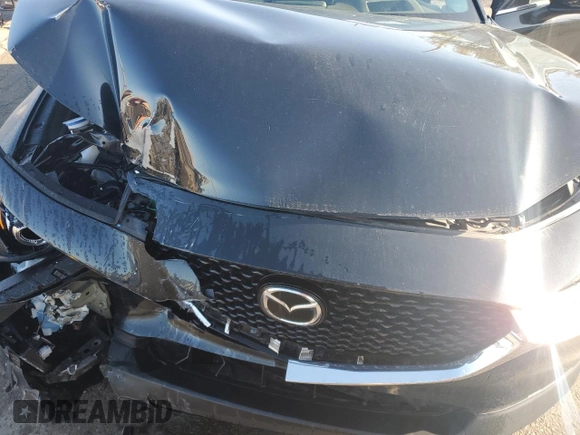 2020 Mazda CX-30 Premium z VIN 3MVDMBEM3LM126527, wystawiony jako Copart lot #53249135 z przebiegiem 42 320 mil mil oraz Szkoda całkowita • Salvage title. Historia ofert i sprzedaży dostępna na DreamBid. Obrazek 13.