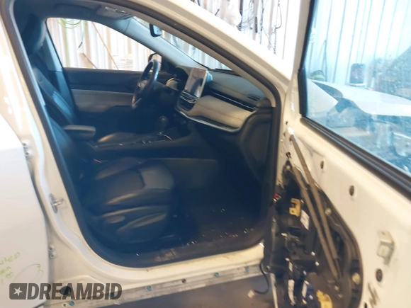 2022 Jeep Compass Latitude with VIN 3C4NJDBB9NT152152, listed as a IAAI auction lot 41377165 with 58,993 mi miles and . Bid and sale history available at DreamBid. Image 5.