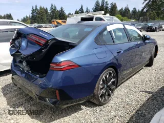 2025 BMW 5 Series with VIN WBA13FK06SCT74610, listed as a Copart auction lot 55362185 with Not provided miles and Salvage title. Bid and sale history available at DreamBid. Image 3.