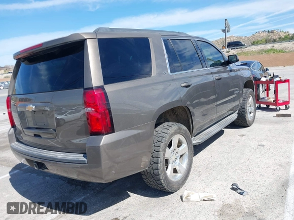 2016 Chevrolet Tahoe LS with VIN 1GNSCAKC7GR419294, listed as a IAAI auction lot 42020006 with 83,945 mi miles and . Bid and sale history available at DreamBid. Image 4.