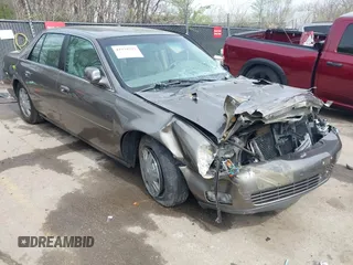 2003 Cadillac DeVille z VIN 1G6KD54Y23U182813, wystawiony jako IAAI lot #41934797 z przebiegiem Nie podano mil oraz . Historia ofert i sprzedaży dostępna na DreamBid. Obrazek 1.