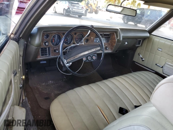 1972 Chevrolet Monte Carlo z VIN 1H57J2L567411, wystawiony jako Copart lot #72465014 z przebiegiem 83 239 mil mil oraz Szkody całkowita. Historia ofert i sprzedaży dostępna na DreamBid. Obrazek 8.