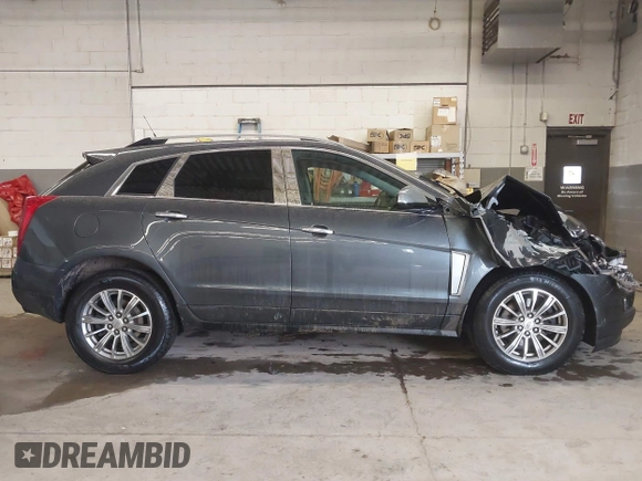 2013 Cadillac SRX Performance Collection with VIN 3GYFNHE37DS530908, listed as a IAAI auction lot 41662796 with 80,254 mi miles. Bid and sale history available at carsss.com. Image 14.