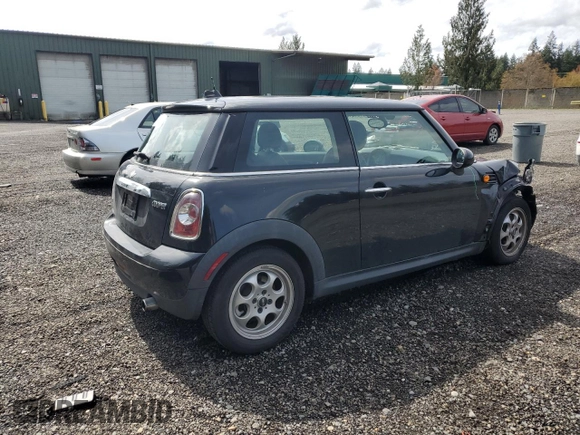 2013 MINI Hardtop with VIN WMWSU3C57DT689655, listed as a Copart auction lot 52161215 with 40,250 mi miles and Salvage Title. Bid and sale history available at DreamBid. Image 3.