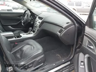 2009 Cadillac CTS AWD z VIN 1G6DG577690116381, wystawiony jako IAAI lot #41944644 z przebiegiem 171 745 mil mil oraz . Historia ofert i sprzedaży dostępna na DreamBid. Obrazek 5.