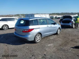 2012 Mazda Mazda5 Sport with VIN JM1CW2BL7C0105928, listed as a IAAI auction lot 42061224 with 59,993 mi miles. Bid and sale history available at carsss.com. Image 4.