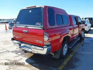 2014 Toyota Tacoma PreRunner with VIN 3TMKU4HN4EM041871, listed as a IAAI auction lot 41641763 with 148,968 mi miles and . Bid and sale history available at DreamBid. Image 4.