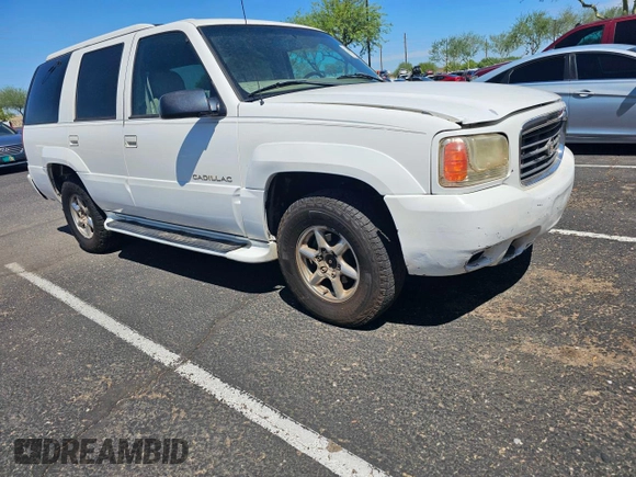 2000 Cadillac Escalade z VIN 1GYEK63R3YR218285, wystawiony jako Copart lot #82063084 z przebiegiem 190 444 mil mil oraz Czysty tytuł • Clean title. Historia ofert i sprzedaży dostępna na DreamBid. Obrazek 1.