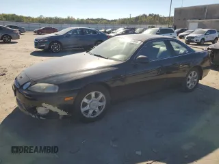 1997 Lexus SC with VIN JT8CH32Y5V0052465, listed as a Copart auction lot 74328664 with 107,353 mi miles and Salvage Title. Bid and sale history available at carsss.com. Image 1.