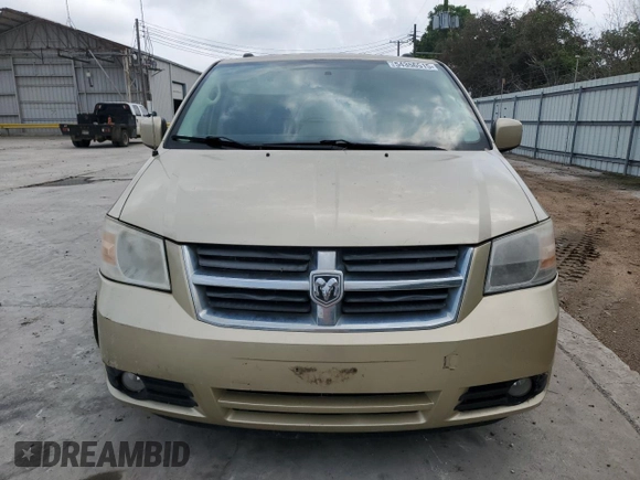 2010 Dodge Grand Caravan with VIN 2D4RN5D12AR197403, listed as a Copart auction lot 54356515 with 105,318 mi miles and Salvage Title. Bid and sale history available at DreamBid. Image 5.