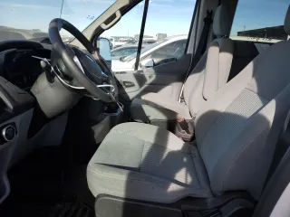 2016 Ford Transit XL with VIN 1FBAX2CG2GKA32214, listed as a Copart auction lot 83233634 with 95,716 mi miles and Salvage title. Bid and sale history available at DreamBid. Image 7.