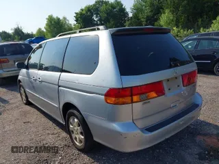 2003 Honda Odyssey EX z VIN 5FNRL18613B111952, wystawiony jako IAAI lot #40852383 z przebiegiem Nie podano mil oraz . Historia ofert i sprzedaży dostępna na DreamBid. Obrazek 3.