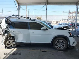 2021 Volkswagen Atlas SE z VIN 1V2HR2CA8MC514027, wystawiony jako IAAI lot #42260413 z przebiegiem 37 687 mil mil oraz . Historia ofert i sprzedaży dostępna na DreamBid. Obrazek 13.