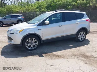 2013 Ford Escape SEL with VIN 1FMCU9HX5DUC09591, listed as a IAAI auction lot 42074088 with 131,554 mi miles. Bid and sale history available at carsss.com. Image 2.