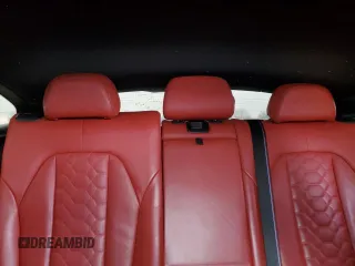 2021 BMW X4 M z VIN 5YMUJ0C03M9F20053, wystawiony jako Copart lot #87595845 z przebiegiem Nie podano mil oraz Szkody całkowita. Historia ofert i sprzedaży dostępna na DreamBid. Obrazek 10.