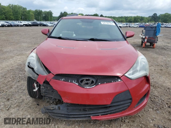 2013 Hyundai Veloster w/Black Int z VIN KMHTC6AD5DU173242, wystawiony jako Copart lot #54733125 z przebiegiem 157 766 mil mil oraz Czysty tytuł • Clean title. Historia ofert i sprzedaży dostępna na DreamBid. Obrazek 5.