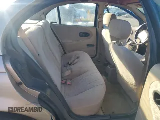 1999 Saturn SL with VIN 1G8ZK5270XZ147170, listed as a Copart auction lot 42169385 with 141,100 mi miles and Clean title. Bid and sale history available at DreamBid. Image 10.