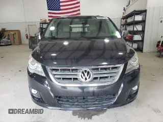 2012 Volkswagen Routan z VIN 2C4RVADG0CR355752, wystawiony jako Copart lot #53687155 z przebiegiem 132 903 mil mil oraz Szkoda całkowita • Salvage title. Historia ofert i sprzedaży dostępna na DreamBid. Obrazek 5.