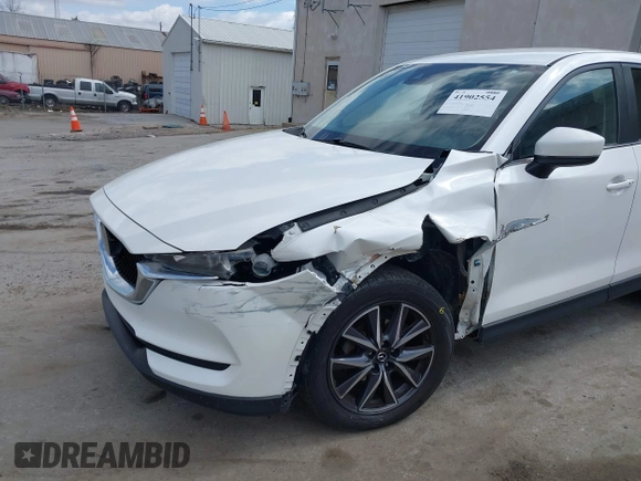2018 Mazda CX-5 Touring with VIN JM3KFBCMXJ0353369, listed as a IAAI auction lot 41902554 with 154,104 mi miles and . Bid and sale history available at DreamBid. Image 6.