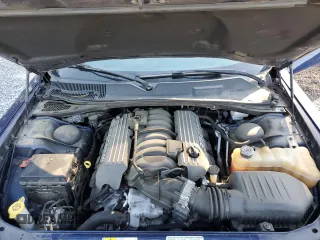 2013 Dodge Challenger SRT-8 z VIN 2C3CDYCJ9DH587681, wystawiony jako Copart lot #58035815 z przebiegiem 59 910 mil mil oraz Tytuł czysty. Historia ofert i sprzedaży dostępna na DreamBid. Obrazek 11.