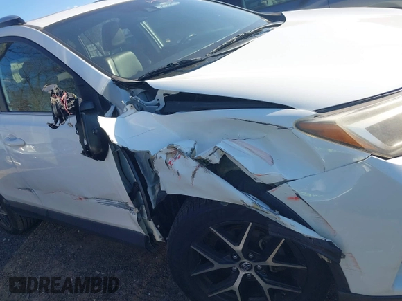 2016 Toyota RAV4 SE with VIN JTMNFREV3GJ070562, listed as a IAAI auction lot 41246655 with 89,174 mi miles and . Bid and sale history available at DreamBid. Image 6.