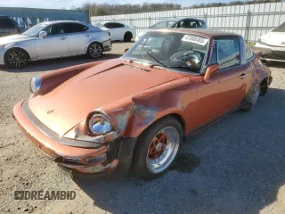 1974 Porsche 911 with VIN 9114111882, listed as a Copart auction lot 47080465 with 4,828 mi miles and Salvage title. Bid and sale history available at DreamBid. Image 1.