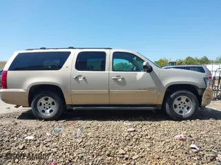 2012 Chevrolet Suburban LT with VIN 1GNSCJE03CR128206, listed as a IAAI auction lot 42002119 with 329,078 mi miles. Bid and sale history available at carsss.com. Image 13.