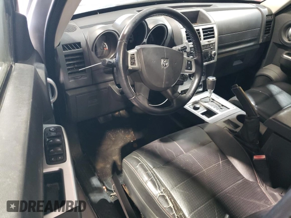 2008 Dodge Nitro R/T z VIN 1D8GU58618W151545, wystawiony jako Copart lot #75465574 z przebiegiem Nie podano mil oraz Szkoda całkowita • Salvage title. Historia ofert i sprzedaży dostępna na DreamBid. Obrazek 8.