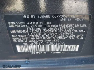 2018 Subaru Crosstrek Premium with VIN JF2GTABCXJH233021, listed as a IAAI auction lot 40963686 with 124,454 mi miles. Bid and sale history available at carsss.com. Image 9.