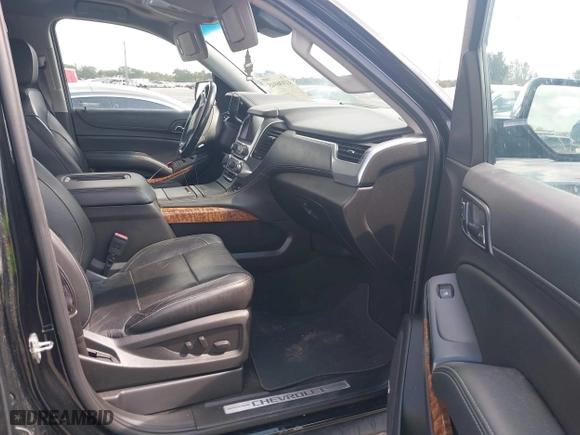 2017 Chevrolet Suburban Premier with VIN 1GNSCJKC4HR127667, listed as a IAAI auction lot 41936945 with 139,006 mi miles. Bid and sale history available at carsss.com. Image 5.